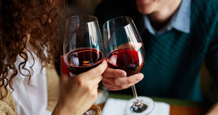 Sedona Restaurants, photo of a happy couple toasting red wine